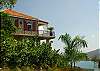 Perched at the top of Seagrape Hill, beautiful Reef Madness is ready to welcome island guests.