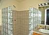 There is a second full bath with glass tiled shower at Christy Ann, too, located on the laundry level.