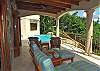 Comfortable conversation areas abound on the large covered deck, providing ample shade areas outdoors all day long.