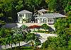 This exclusive three bedroom, three and a half bath villa offers stunning views of Rendezvous Bay and Ditliff Point.