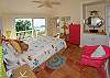 This air-conditioned bedroom in the guest cottage features a queen size bed and  tropical wicker furniture. Wake up after a good night's sleep to this wonderful ocean view!!