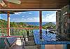 The six hundred square foot lower deck is an open-air living space, complete with lounge area and a beautifully tiled wet-bar.