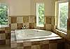 In door Jacuzzi tubs are located in the master baths of all condo suites  except units 2 & 3.