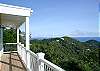 The upper deck spans the entire property across the pool area and to the separate bedroom wing where the master bedroom suite is located.