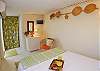 There is plenty of room for all of your things and there is even a half-bath ensuite.