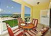 The three bedroom condos have private balconies-this one overlooks the tiki stand.