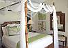 The guest bedroom also has a magnificent view for you to enjoy from your queen sized four poster bed.