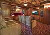 With a 50" plasma screen, 5.1 Dolby Digital Surround sound system, six theatre reclining chairs and a large library of films in VHS, laser disc, and DVD formats...Kismet's home theater is truly amazing!