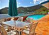 The two exterior tables each seat 4-6 people comfortably for a tranquil outdoor dining experience.