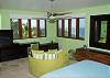 The two master bedrooms each have a king bed and a large 62 inch diameter chair and a half for reading, lounging, and a flat screen TV for viewing in privacy and comfort.