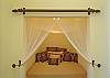 The second king bed in the Serengeti Room is built right into an alcove in the wall. Two interior spiral staircases, as well as a tiled exterior stairway, can access both lower bedrooms.
