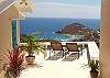 Magic View is situated mountainside above the Caribbean Sea with panoramic views of Ditleff, Chocolate Hole, Hart Bay, St. Thomas & St. Croix. This beautifully appointed home features two air-conditioned master suites, each with a full bath & tropical Tradewinds.