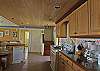 Enter the home through the spacious 20’ long kitchen,  a chef’s and entertainers dream.