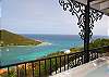 Beyond the railings with their Tuscany design, watch small fishing boats navigate through the bay below.