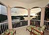 Comfortable lounge chair seating allows you and your guest to enjoy heavenly views from the south-east facing balcony.