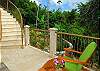 At the bottom of the graceful stairway you will find the third bedroom suite. Perfect for those who want a little extra privacy, this suite is furnished similarly to the others.