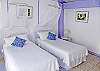 This particular bedroom can be made up as twin beds instead of a king.