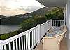 Enjoy marvelous views of Fish Bay and beyond from this comfortable seating. Both the main house-bedrooms are joined in front by this breezy covered porch. It is a perfect spot to watch cruise ships go by in the early evening, or to stargaze late at night.