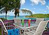 Unit 8E is located on the parking lot level and has a wrap-around balcony overlooking the  pool with stunning views of Cruz Bay and the Caribbean cays.