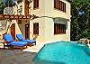 There are two spacious and beautifully appointed suites in this bedroom pavillion. The 10x22 ft. solar heated pool with infinity edge has a waterfall feature designed to sooth the senses.