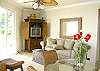 The lower level living room is light, airy and comfortable.
