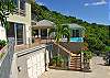 At Latitude, you're nestled into the hillside with complete and direct views of Kline Bay.

 Just a few steps up from the parking level is the main deck which encompasses both the pool and spa as well as outside dining options.