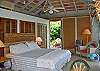 A separate guest cottage at Maison Miele, with king-sized bed and air conditioning, is located just a short pathway away from the main house.