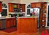 The colorful kitchen at Calypso Del Sol is meant to be enjoyed. Its solid surface countertop boasts an integrated sink.