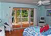 The lower bedrooms also open onto a covered deck which features unique rockers for reading and enjoyng fantastic sunsets!