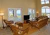 The living room area faces the views and french doors can make your living seamless inside and out.