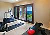The gym features a Free Motion 5.3 Elliptical machine, Bowflex weights + weight bench;