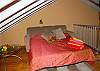 The pullout sofa in the loft above the greatroom provides another sleeping area for a fifth and sixth person.