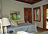 Casual and comfortable, the lower bedroom is perfect for those that want a little extra privacy. The ensuite bathroom is smaller than the others, but just as well appointed.