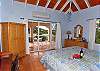 At the far end of the large coverd deck, is the master bedroom. It can also be accessed directly from the great room.
