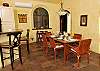 The heavy wood dining table seats six comfortably.