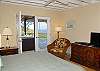French doors lead directly out to the spa area.