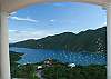 Watch the sailboats bob in the harbor below and the gentle breezes blow over mountain ranges in the distance.