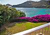 Villa Rendezvous faces south and relishes in sea breezes and sun the whole day.  The flat grassy lawn, edged with bougainvillea, compliments the picturesque waters below.