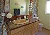 Bathrooms have custom cabinetry of cypress, mahogany and teak, and handmade soaps - glycerin for the sinks, and exfoliating scrubs for the showers.