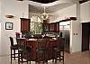 Bar seating around the kitchen counter allows the chef to enjoy casual conversation while preparing the meal and is also a great option for more casual dining in-between meal times.