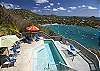 The clever two-level pool deck keeps the front railing below your view line when in the pool. It's easy to see why Eaglesnest is a perennial favorite for visitors to St. John!