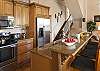 The bright and airy kitchen is fully equipped with everything you need to prepare a home cooked meal or even better-have a private chef come in and cook for you! The granite counter tops and stainless steel appliances are sleek and modern. Picture yourself here having a relaxing meal with your loved ones.