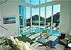 This luxury villa offers a skillful floor plan designed to maximize views from every angle.