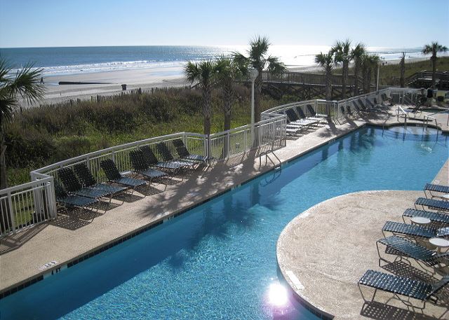 Resort style oasis with this great pool and sun deck