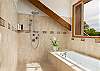 Loft shower and jetted tub
