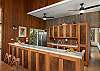 Custom built Koa kitchen cabinets