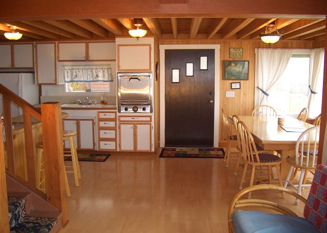 Image Open Kitchen and Dining Area with Full Ocean View