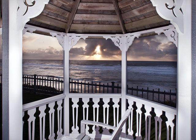 Image Gazebo in large private grass yard overlooks the oceanfront