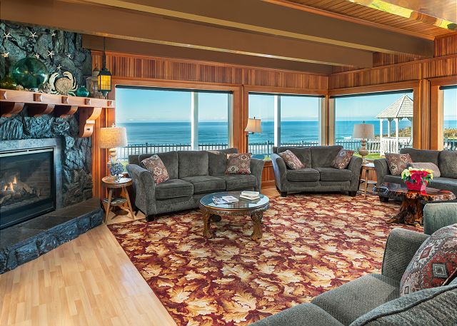 Image Large open living room with copper beamed ceilings.