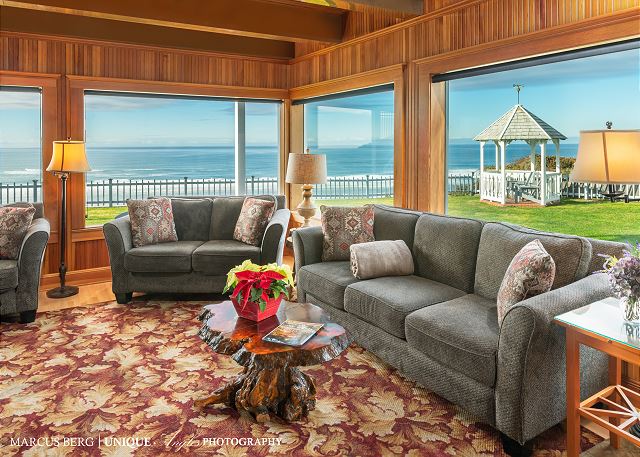Image Living room has 4 sofas overlooking the oceanfront